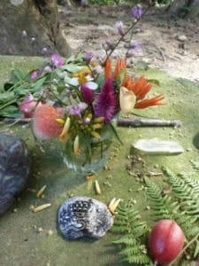 Personal items and wild flowers and seeds touch the heart