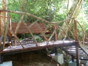 The resting place on the staircase down to the deck- sculpted out of driftwood from the river