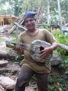 Smiling beauty- Duende found an old sculpted guitar burried in the woods